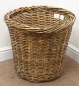 Wicker log basket of circular tapered form,