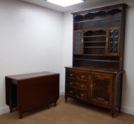 Early 20th century oak dresser three shelf back with two lead glazed doors,