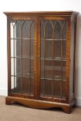 Early 20th century mahogany display cabinet, projecting cornice,