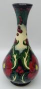 Moorcroft Ruby pattern bottle shaped vase designed by Rachel Bishop,