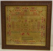 William IV sampler, worked with the alphabet, religious text, strawberry motif border & crest,