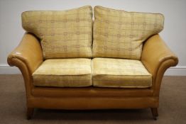 Early 20th century two seat sofa upholstered in tan leather with check fabric cushions,