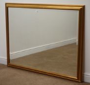 Gilt framed bevelled edge rectangular wall mirror, W131cm,