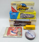 Three Corgi Classic die cast models, Stobart Coasters, all boxed and a yellow bus,