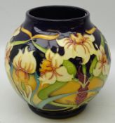 Moorcroft limited edition globular vase decorated in the Royal Gold pattern,