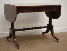 Regency style cross banded and inlaid mahogany sofa table, with two drawers, turned supports,