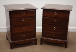 Pair Stag Minstrel mahogany four drawer chests, ring handles on bracket feet, W53cm, H72cm,