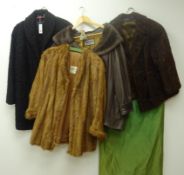 Two vintage Persian lamb coats in brown and black,