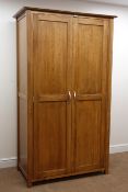 Modern oak double wardrobe, moulded top, two doors enclosing hanging rail, stile supports, W110cm,