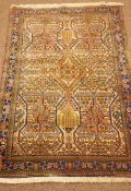 Fine Keshan multicoloured rug, central medallion, repeating border,