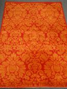 Figaro red ground rug, floral pattern field,