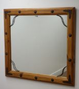 Large rectangular pine framed mirror with metal strapping and studs, W103cm,