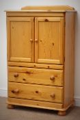 Pine tallboy with two cupboards above two drawers, bun feet, W76cm, H123cm,