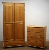 Solid pine wardrobe, two panelled doors above single drawer, on bun feet, (W90cm, H180cm,