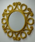 Circular bevel edged wall mirror, with scrolled frame,
