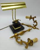 Bankers style brass desk lamp and two ornate gilt metal wall sconces,