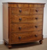 Victorian mahogany bow front chest, of two short and three long drawers, turned supports, W115cm,