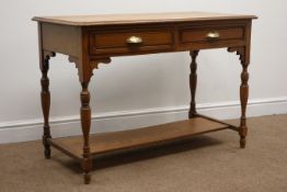 Edwardian oak two drawer side table, turned supports with platform stretcher, W106cm, D51cm,