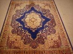 Large Grosvenor Seamless Wilton blue ground carpet, with central medallion,