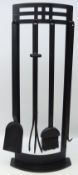 Four piece long handed companion set on bow fronted stand, black finish, W35cm,