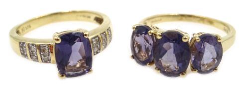 Gold emerald cut iolite ring, with diamond shoulders and a gold three stone iolite ring,