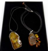 Two large silver Baltic amber set pendants, stamped 925,