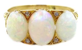 Gold three stone opal and diamond ring, stamped 18 Condition Report Approx 4.