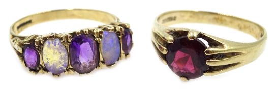 Garnet set gold ring London 1962 and an amethyst and opal gold ring both hallmarked 9ct