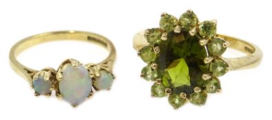 Three stone opal gold ring and a green cluster gold ring both hallmarked 9ct Condition