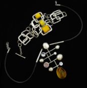 Contemporary silver amber and pearl pendant on leather and silver necklace,
