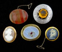 Gold mounted agate brooch, gold mounted hardstone cameo brooch and gold mounted Wedgwood brooch,