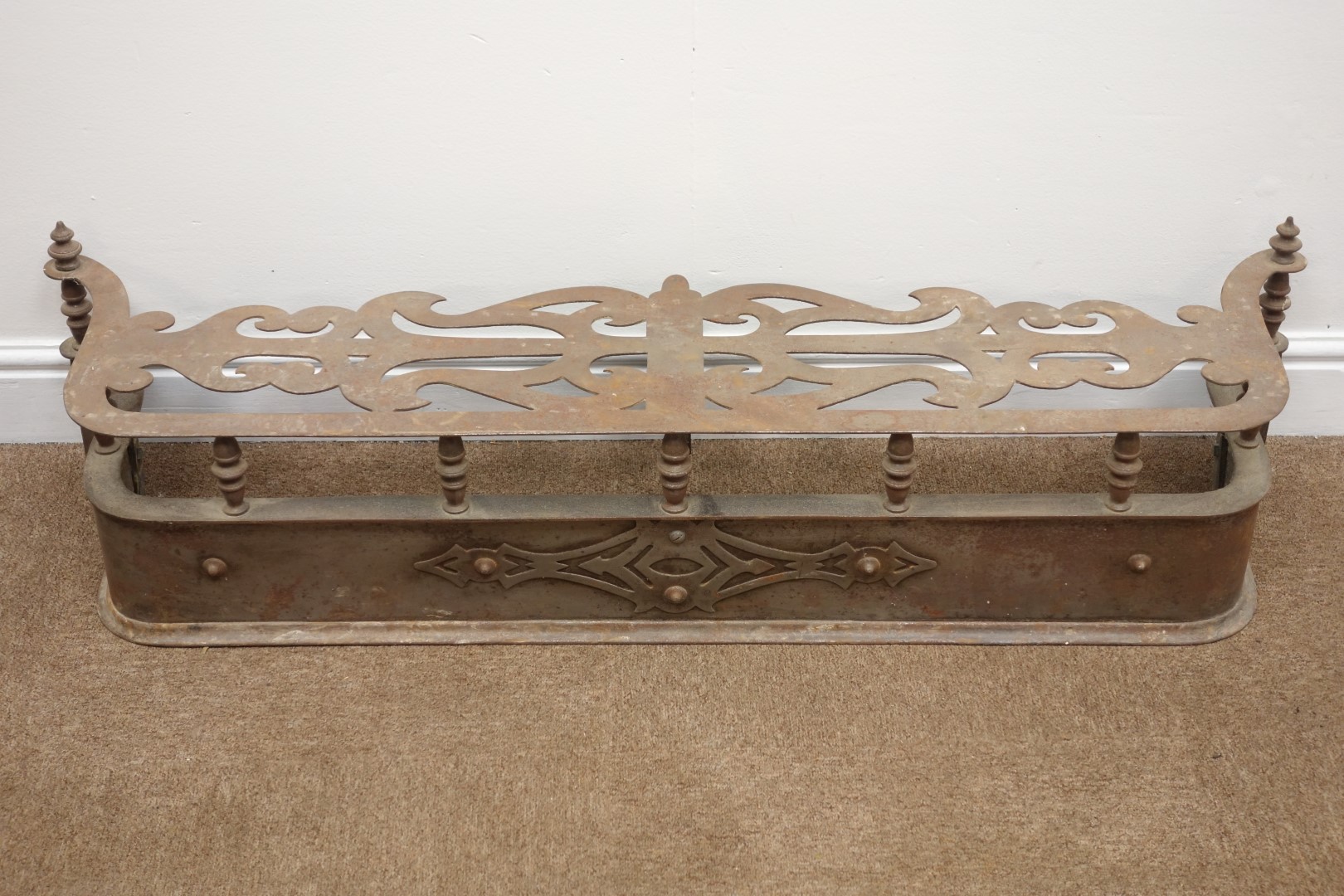Victorian D shaped steel fire fender, shaped and pierced top with two finials, W121cm, H29cm, - Image 3 of 4