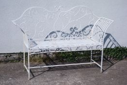 White painted open work wrought metal garden bench,