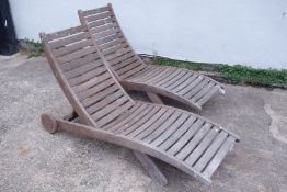 Pair Alexander Rose hardwood adjustable sun loungers on wheels, W61cm, L200cm,