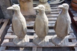 Three composite stone models of Penguins, H68cm,