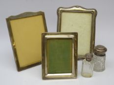 Three silver fronted picture easel frames; arched top and oak mount by, Sanders & Mackenzie H22cm,