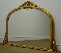 Gilt framed overmantle arched mirror, carved and pierced cresting rail, W123cm,