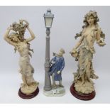 Lladro figure Lamplighter and two Florence Giuseppe Armani Nouveau style female figures on circular