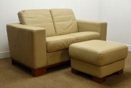 Two seat sofa, upholstered in beige leatherette fabric (W155cm) and two stools,