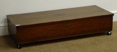 Early 20th century oak Dowery box, hinged lid, castor supports, W98cm, H22cm,