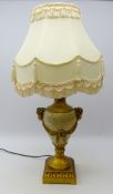 Classical style gilded baluster table lamp with cherub masks on moulded square base with fringed