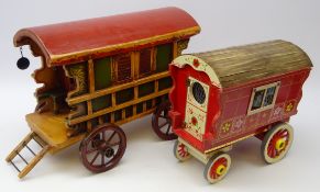 Two painted wooden Gypsy caravan models,