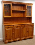 Oregon pine dresser, twin shelf back with two lead glazed cupboards,