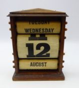 Edwardian oak cased perpetual calendar,