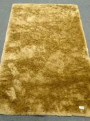 Plush gold long pile rug, 240cm x 150cm Condition Report <a href='//www.