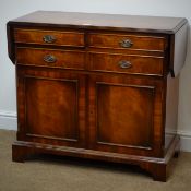Georgian style mahogany drop leaf side cabinet with three drawers, two cupboard doors, plinth base,