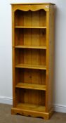 Solid pine open bookcase, four shelves, shaped plinth base, W61cm,