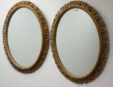 Pair oval gilt framed wall mirrors W67cm, H85cm Condition Report <a href='//www.