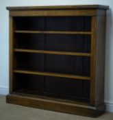 Victorian oak open bookcase, three adjustable shelves, plinth base, W122cm, H118cm,