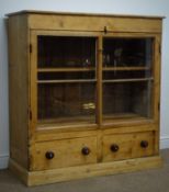 19th century pine cabinet two glazed doors, two shelves above two doors, W118cm, H123cm,